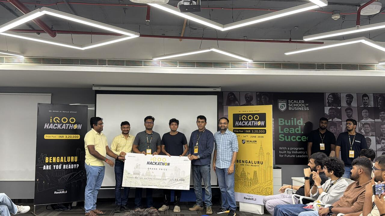 Ayaan Khan's team receiving the iQOO Hackathon 2026 grand prize cheque